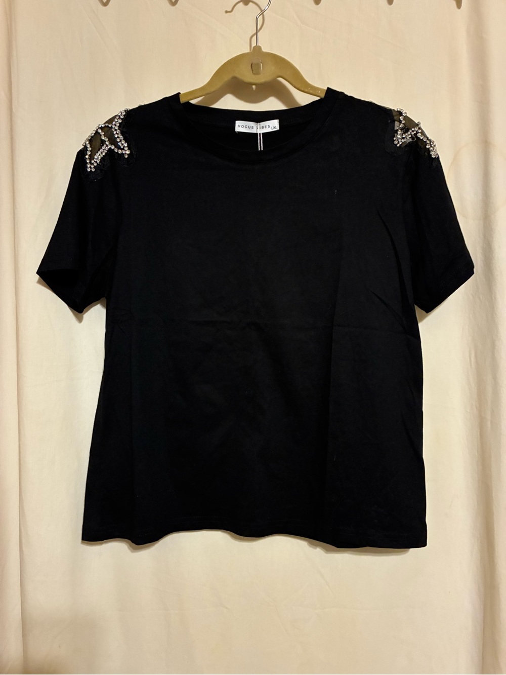 Vogue Vibes Rhinestone Star Mesh
Shoulder Tee